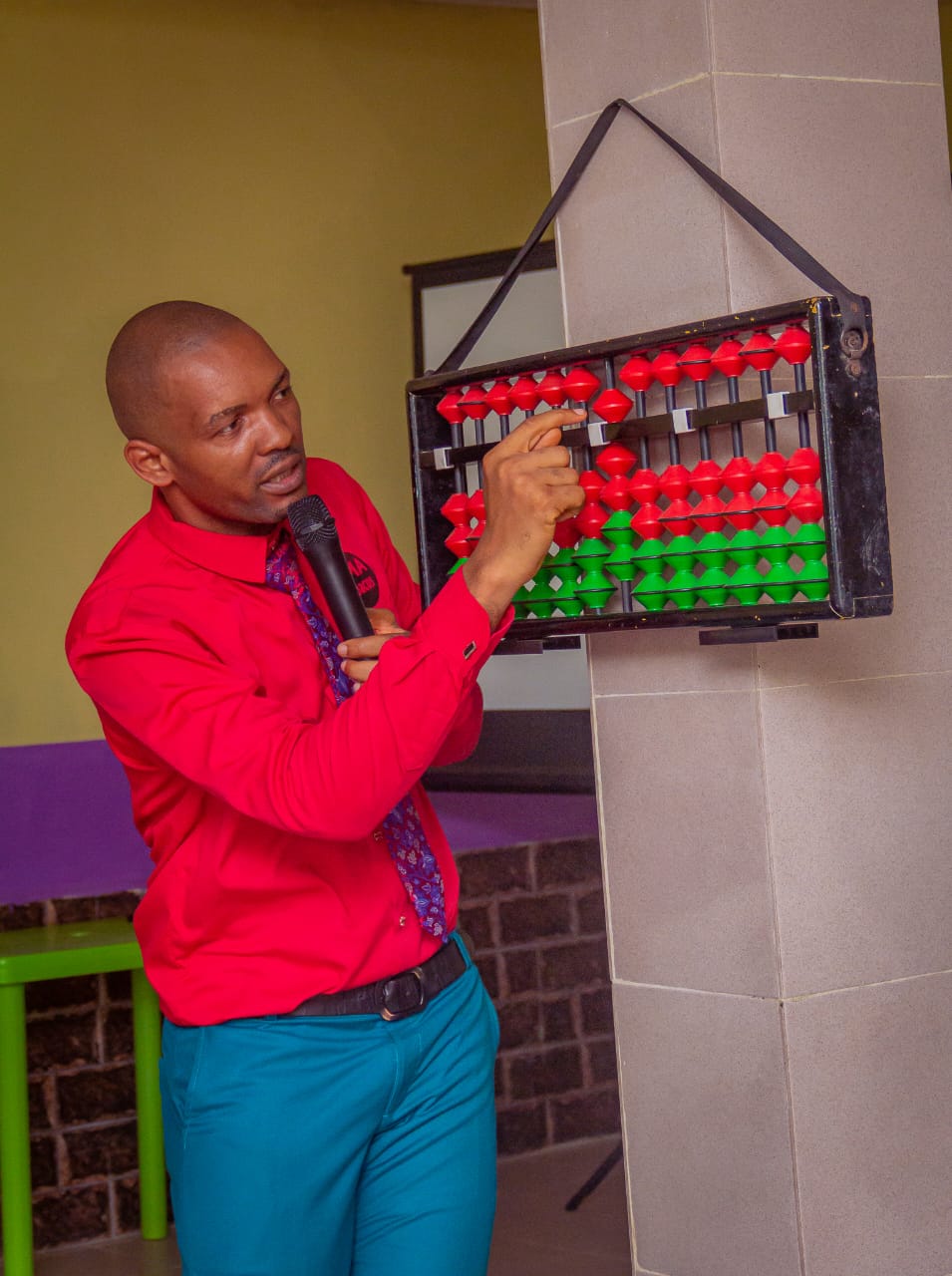 Instructor talking about the abacus in Nigeria