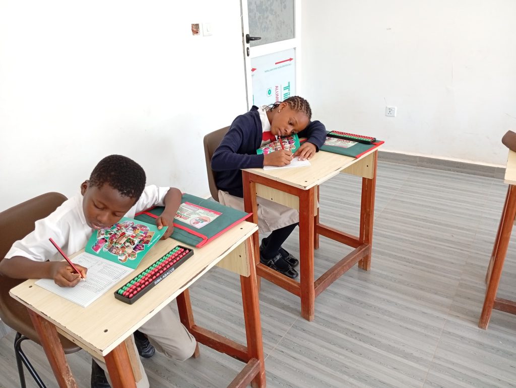 Children learning abacus and STEM skills in Nigeria with SIMA Abacus