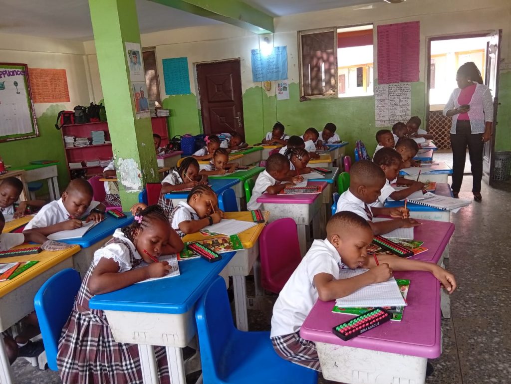A child using the SIMA Abacus methodology in class to improve focus and brain power