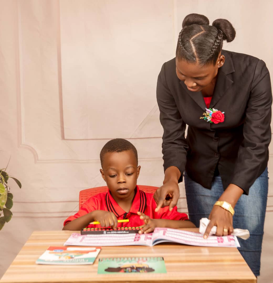 Child learning abacus demonstrating left and right brain activation.
